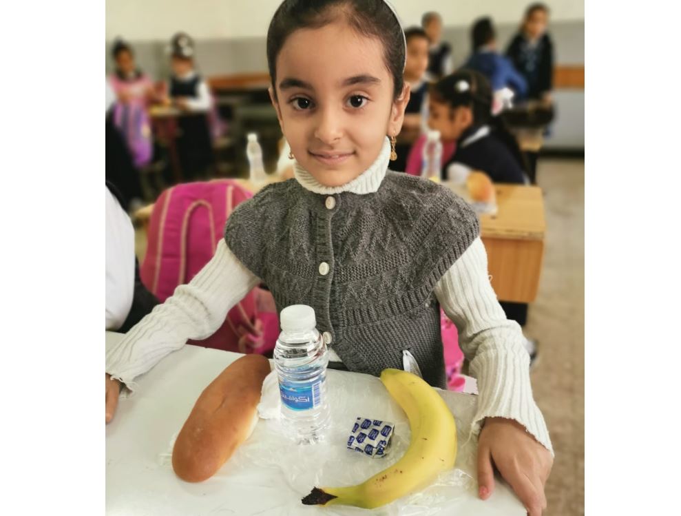 يقوم برنامج الأغذية العالمي بتوزيع وجبات طازجة خلال العام الدراسي على 330 ألف طفل في 1200 مدرسة ابتدائية في جميع أنحاء العراق. صورة: برنامج الأغذية العالمي