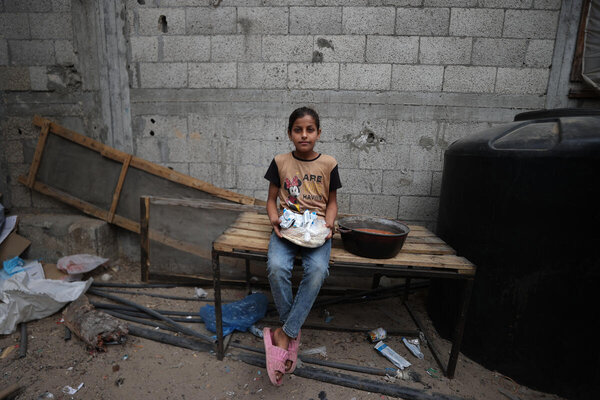 A girl in Khan Younis in Gaza in mid-April. By the end of that month most Gazans had run out of supplies received before the 2 March blockade. Photo: WFP/Ali Jadallah