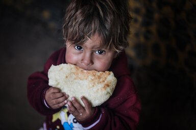 Palestine. Families receiving food parcels in Gaza