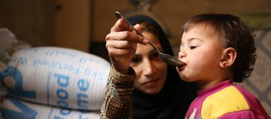 WFP/Abeer Etefa الأم والطفل