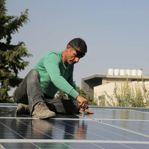 a man is working on a roof