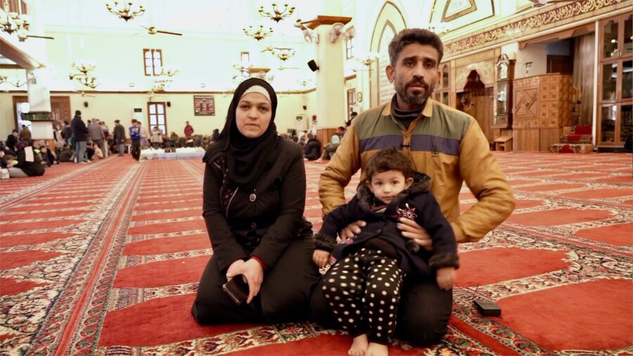 Ibrahim Khalil and his family found shelter and WFP meals in a mosque in Lattakia, Syria. They escaped from their home minutes before it collapsed. Photo: WFP/Ghazwan Jabasini