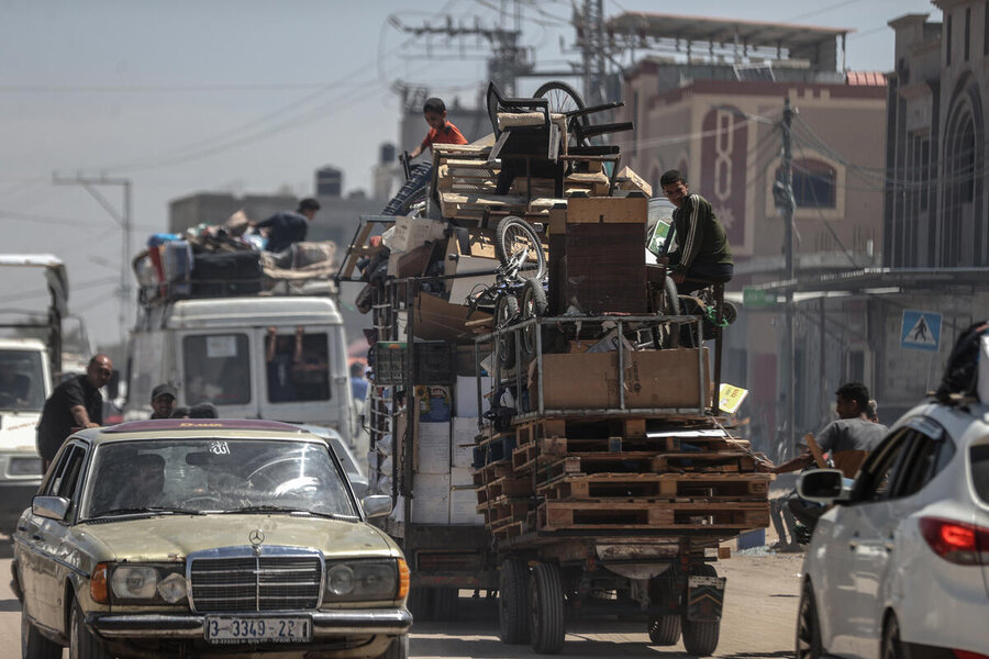 Families evacuating the southern Gazan city of Rafah in August because of intensifying airstrikes. Many have been displaced multiple times over the past year. Photo: WFP/Ali Jadallah