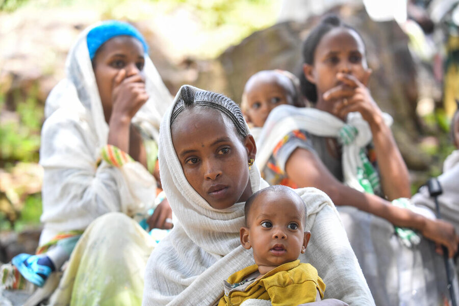 Women and children gather together in Ethiopia's Tigray region, which has witnessed high malnutrition and hunger. Photo: WFP/Michael Tewelde