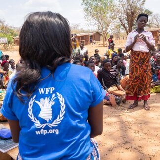 WFP staff talking with group of people