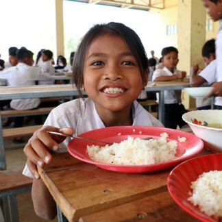 Kid eating healthy school meal